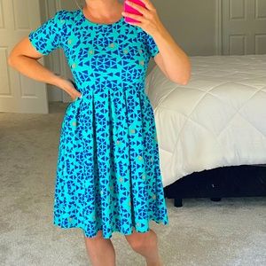 It’s has pockets! Cute geometric dress.